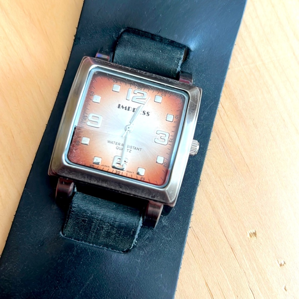 Impress Brand Unisex Watch with cool, wide black leather strap.